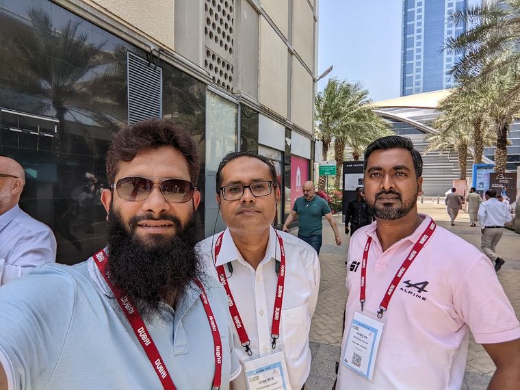 Three attendees outside the Arabian Travel Market 2023 venue in Dubai