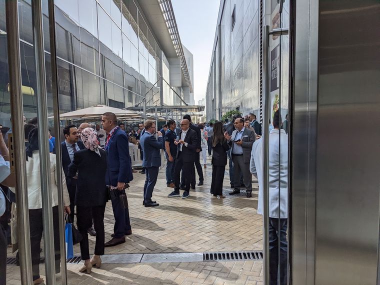 Attendees meeting outside the halls at Arabian Travel Market 2023