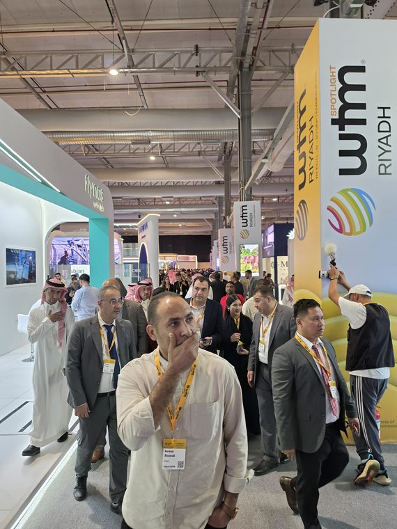 The main aisle and WTM Spotlight Riyadh signage on the exhibition floor